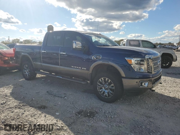 2016 Nissan Titan XD Platinum Reserve with VIN 1N6BA1F46GN512586, listed as a Copart auction lot 82406194 with 115,666 mi miles and Salvage Title. Bid and sale history available at carsss.com. Image 1.