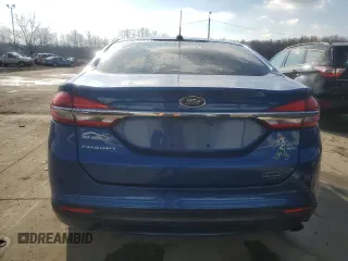 2018 Ford Fusion SE with VIN 3FA6P0H77JR188708, listed as a Copart auction lot 47030095 with 141,050 mi miles and Salvage Title. Bid and sale history available at DreamBid. Image 6.