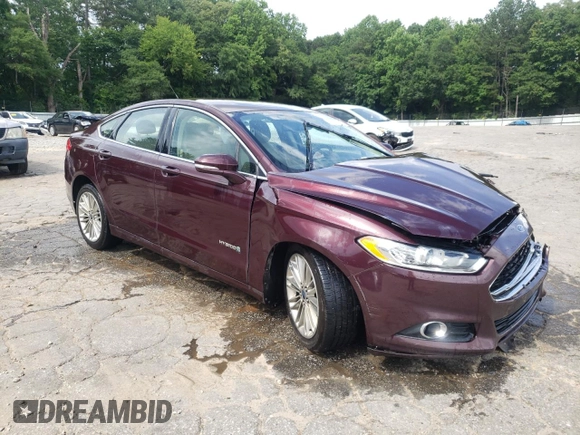 2013 Ford Fusion SE Hybrid z VIN 3FA6P0LU7DR197801, wystawiony jako Copart lot #60468095 z przebiegiem 169 215 mil mil oraz Szkoda całkowita • Salvage title. Historia ofert i sprzedaży dostępna na DreamBid. Obrazek 4.