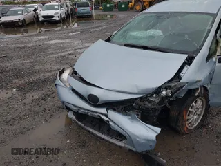 2016 Toyota Prius Two z VIN JTDZN3EUXGJ053220, wystawiony jako IAAI lot #42318675 z przebiegiem Nie podano mil oraz . Historia ofert i sprzedaży dostępna na DreamBid. Obrazek 6.