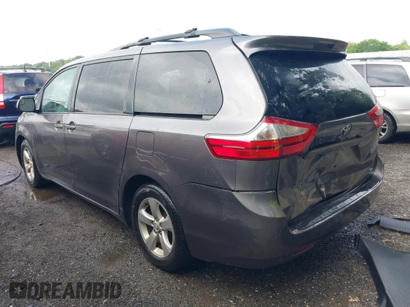 2015 Toyota Sienna LE AAS with VIN 5TDKK3DC8FS632906, listed as a IAAI auction lot 42533867 with 128,980 mi miles and . Bid and sale history available at DreamBid. Image 3.