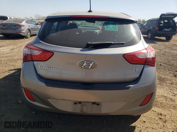 2014 Hyundai Elantra GT with VIN KMHD35LH8EU218254, listed as a Copart auction lot 74038834 with 208,459 mi miles and Salvage Title. Bid and sale history available at carsss.com. Image 6.