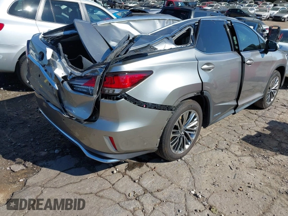2020 Lexus RX with VIN JTJJGKFA7L2013877, listed as a IAAI auction lot 40678497 with 67,271 mi miles. Bid and sale history available at carsss.com. Image 4.