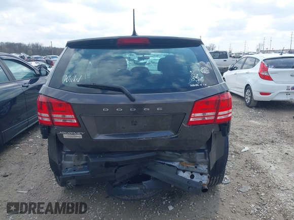 2014 Dodge Journey SE with VIN 3C4PDCAB1ET219760, listed as a IAAI auction lot 42013441 with 106,212 mi miles and . Bid and sale history available at carsss.com. Image 17.