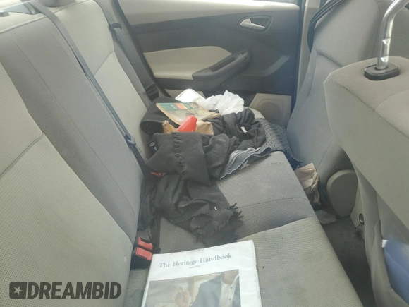 2012 Ford Focus SE with VIN 1FAHP3F28CL173251, listed as a Copart auction lot 56394695 with Not provided miles and Non repairable. Bid and sale history available at DreamBid. Image 10.