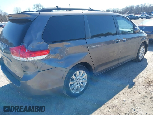 2012 Toyota Sienna XLE with VIN 5TDDK3DC5CS047530, listed as a IAAI auction lot 41780049 with 209,812 mi miles. Bid and sale history available at carsss.com. Image 4.