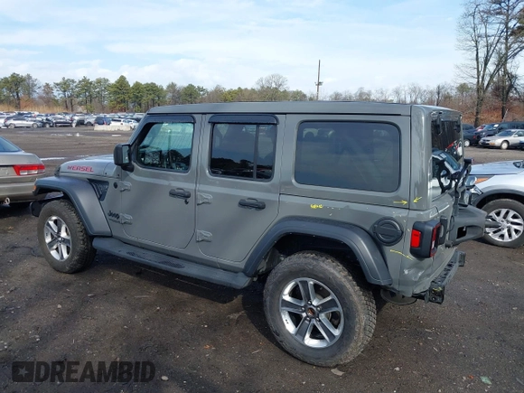 2021 Jeep Wrangler Unlimited Willys Sport with VIN 1C4HJXDGXMW767633, listed as a IAAI auction lot 41700168 with 37,994 mi miles and . Bid and sale history available at DreamBid. Image 14.
