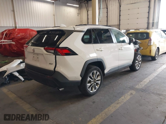 2020 Toyota RAV4 XLE Premium with VIN 2T3C1RFV1LC042163, listed as a IAAI auction lot 40672979 with 76,016 mi miles. Bid and sale history available at carsss.com. Image 4.