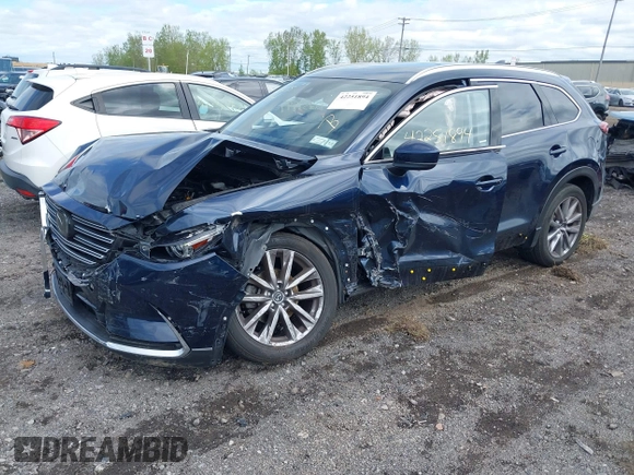2021 Mazda CX-9 Grand Touring with VIN JM3TCBDY3M0537975, listed as a IAAI auction lot 42251894 with 50,156 mi miles and . Bid and sale history available at DreamBid. Image 17.