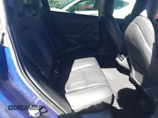 2023 Tesla Model 3 with VIN 5YJ3E1EA5PF652212, listed as a Copart auction lot 57348395 with 8,780 mi miles and Salvage title. Bid and sale history available at DreamBid. Image 10.