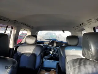 2012 Infiniti QX56 7-passenger with VIN JN8AZ2NE1C9021857, listed as a Copart auction lot 76967164 with 153,958 mi miles and Salvage Title. Bid and sale history available at carsss.com. Image 10.