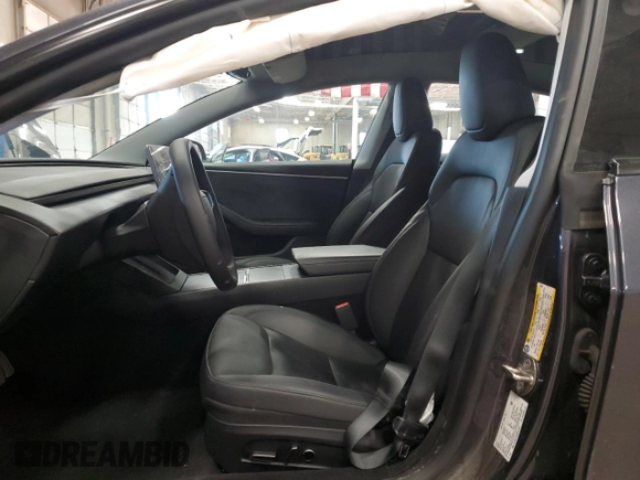 2024 Tesla Model 3 Long Range with VIN 5YJ3E1EBXRF818977, listed as a Copart auction lot 47303885 with 14,189 mi miles and Salvage Title. Bid and sale history available at DreamBid. Image 7.