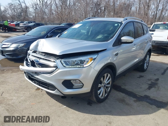 2017 Ford Escape Titanium with VIN 1FMCU0JD3HUB13234, listed as a IAAI auction lot 41760944 with 113,361 mi miles. Bid and sale history available at carsss.com. Image 2.