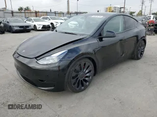 2024 Tesla Model Y Performance with VIN 7SAYGDEF0RA281380, listed as a Copart auction lot 53075715 with 14,131 mi miles and Salvage Title. Bid and sale history available at DreamBid. Image 1.
