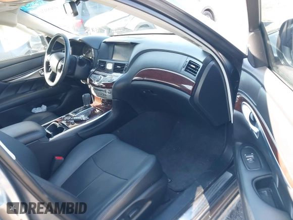 2018 Infiniti Q70 Luxe with VIN JN1BY1AR3JM220783, listed as a IAAI auction lot 41480241 with 95,739 mi miles and . Bid and sale history available at DreamBid. Image 5.