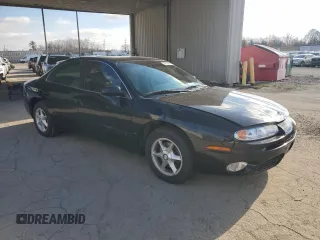 2001 Oldsmobile Aurora with VIN 1G3GR62H714104411, listed as a Copart auction lot 82601984 with 135,486 mi miles and Salvage Title. Bid and sale history available at DreamBid. Image 4.