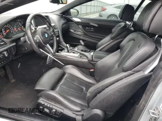 2014 BMW M6 z VIN WBSLZ9C56EDZ78719, wystawiony jako Copart lot #42445545 z przebiegiem 63 691 mil mil oraz Szkoda całkowita • Salvage title. Historia ofert i sprzedaży dostępna na DreamBid. Obrazek 7.