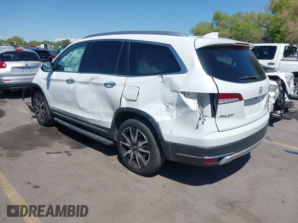 2021 Honda Pilot Touring 8-Passenger z VIN 5FNYF6H94MB087593, wystawiony jako IAAI lot #42153310 z przebiegiem 30 400 mil mil oraz . Historia ofert i sprzedaży dostępna na DreamBid. Obrazek 3.