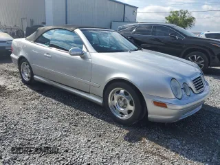 2000 Mercedes-Benz CLK 320/430 z VIN WDBLK70G4YT035047, wystawiony jako Copart lot #52852405 z przebiegiem 141 197 mil mil oraz Szkoda całkowita • Salvage title. Historia ofert i sprzedaży dostępna na DreamBid. Obrazek 4.