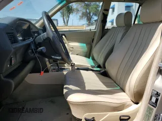 1993 Mercedes-Benz 190 z VIN WDBDA28D1PG089658, wystawiony jako Copart lot #58623165 z przebiegiem 132 317 mil mil oraz Tytuł czysty. Historia ofert i sprzedaży dostępna na DreamBid. Obrazek 7.