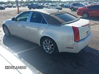 2008 Cadillac CTS AWD with VIN 1G6DG577780129509, listed as a IAAI auction lot 41703785 with 144,440 mi miles and . Bid and sale history available at carsss.com. Image 3.