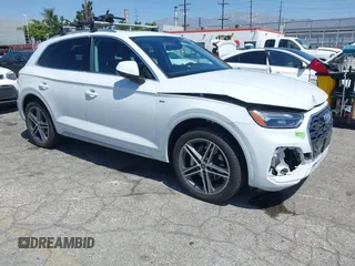 2021 Audi Q5 Premium Plus with VIN WA1E2AFY1M2043365, listed as a IAAI auction lot 42286970 with 28,438 mi miles and . Bid and sale history available at DreamBid. Image 1.