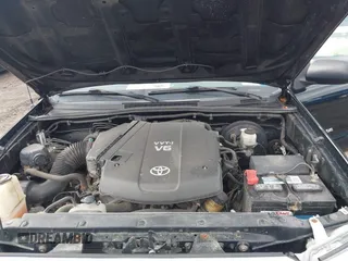 2013 Toyota Tacoma with VIN 5TFUU4EN4DX050303, listed as a IAAI auction lot 41833470 with 117,371 mi miles and . Bid and sale history available at DreamBid. Image 10.