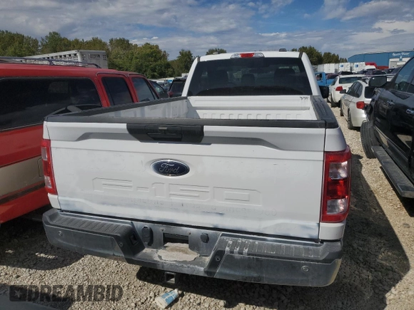 2021 Ford F-150 XL with VIN 1FTMF1EB4MKE11721, listed as a Copart auction lot 65990284 with Not provided miles and Salvage title. Bid and sale history available at DreamBid. Image 6.