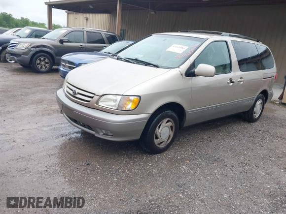 2001 Toyota Sienna LE with VIN 4T3ZF13CX1U367504, listed as a IAAI auction lot 42111583 with 302,801 mi miles and . Bid and sale history available at DreamBid. Image 2.