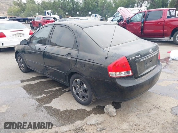 2008 Kia Spectra EX with VIN KNAFE122985511931, listed as a IAAI auction lot 42111053 with 251,276 mi miles. Bid and sale history available at carsss.com. Image 3.