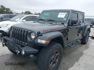 2020 Jeep Gladiator Rubicon with VIN 1C6JJTBG8LL135573, listed as a IAAI auction lot 41585896 with 79,070 mi miles and . Bid and sale history available at DreamBid. Image 17.