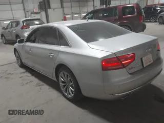 2011 Audi A8 with VIN WAURVAFD5BN014214, listed as a IAAI auction lot 41396044 with 131,764 mi miles and . Bid and sale history available at DreamBid. Image 3.