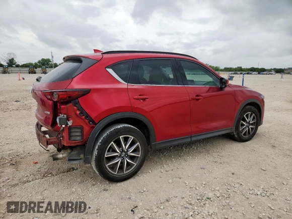 2018 Mazda CX-5 Grand Touring with VIN JM3KFADM8J0451535, listed as a Copart auction lot 59990435 with 77,163 mi miles and Salvage title. Bid and sale history available at DreamBid. Image 3.