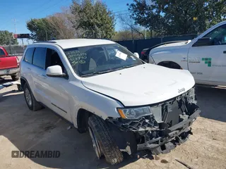 2018 Jeep Grand Cherokee Laredo E with VIN 1C4RJEAG2JC428990, listed as a IAAI auction lot 41218996 with 123,758 mi miles. Bid and sale history available at carsss.com. Image 1.