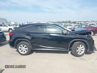 2016 Lexus RX 350 z VIN 2T2BZMCA4GC047800, wystawiony jako IAAI lot #42270406 z przebiegiem 112 181 mil mil oraz . Historia ofert i sprzedaży dostępna na DreamBid. Obrazek 13.