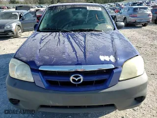 2006 Mazda Tribute i with VIN 4F2YZ02Z96KM20907, listed as a Copart auction lot 86762764 with 220,438 mi miles and Salvage Title. Bid and sale history available at carsss.com. Image 11.