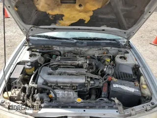 1999 Infiniti G20 z VIN JNKCP11A8XT015021, wystawiony jako Copart lot #67966844 z przebiegiem 268 922 mil mil oraz Szkody całkowita. Historia ofert i sprzedaży dostępna na DreamBid. Obrazek 12.