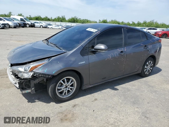 2020 Toyota Prius L Eco z VIN JTDKARFU9L3105675, wystawiony jako Copart lot #54587165 z przebiegiem 130 560 mil mil oraz Szkoda całkowita • Salvage title. Historia ofert i sprzedaży dostępna na DreamBid. Obrazek 1.