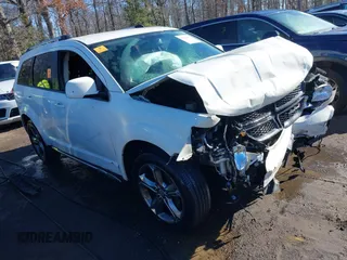 2016 Dodge Journey Crossroad z VIN 3C4PDCGBXGT131753, wystawiony jako IAAI lot #41568428 z przebiegiem 138 954 mil mil oraz . Historia ofert i sprzedaży dostępna na DreamBid. Obrazek 1.