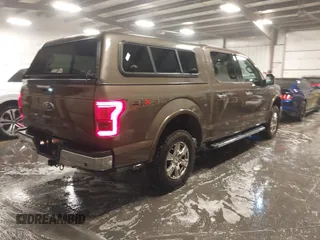 2015 Ford F-150 XLT with VIN 1FTEW1EG8FKD90178, listed as a IAAI auction lot 41163598 with 183,308 mi miles. Bid and sale history available at carsss.com. Image 4.
