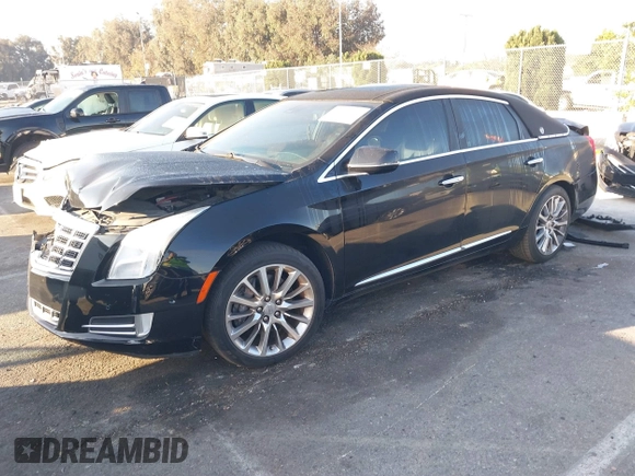 2014 Cadillac XTS Luxury with VIN 2G61M5S31E9290150, listed as a IAAI auction lot 41653055 with 174,553 mi miles and . Bid and sale history available at DreamBid. Image 2.