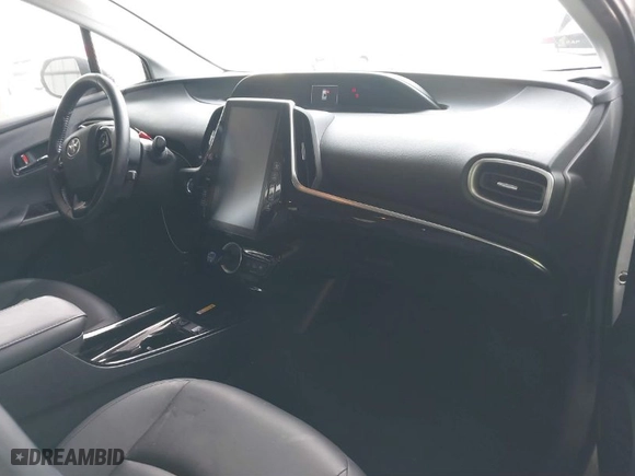 2022 Toyota Prius Prime LE with VIN JTDKAMFP5N3212691, listed as a IAAI auction lot 41443440 with 64,365 mi miles. Bid and sale history available at carsss.com. Image 5.