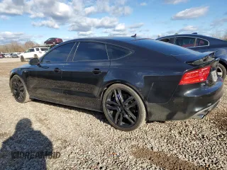 2014 Audi S7 Prestige with VIN WAUW2AFC1EN006649, listed as a Copart auction lot 80269974 with 147,279 mi miles and Salvage Title. Bid and sale history available at carsss.com. Image 2.