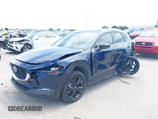 2024 Mazda CX-30 S Select Sport z VIN 3MVDMBBM1RM655682, wystawiony jako IAAI lot #42063971 z przebiegiem 6 771 mil mil oraz . Historia ofert i sprzedaży dostępna na DreamBid. Obrazek 17.