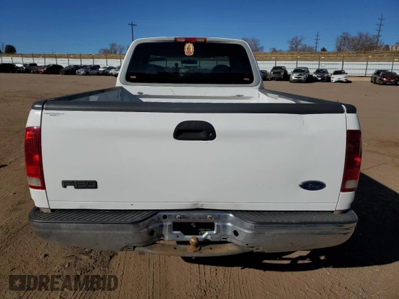1998 Ford F-150 with VIN 1FTZX18W3WNA25682, listed as a Copart auction lot 47494755 with 197,389 mi miles and Salvage title. Bid and sale history available at DreamBid. Image 6.