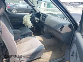 1998 Nissan Frontier XE with VIN 1N6DD26S4WC358779, listed as a IAAI auction lot 42401882 with Not provided miles and . Bid and sale history available at DreamBid. Image 5.