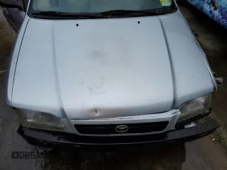 1997 Toyota Tercel CE z VIN JT2AC52L1V0227973, wystawiony jako Copart lot #56672512 z przebiegiem 301 799 mil mil oraz Szkody całkowita. Historia ofert i sprzedaży dostępna na DreamBid. Obrazek 7.