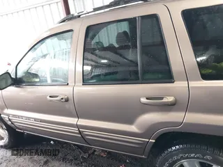 2001 Jeep Grand Cherokee Limited with VIN 1J4GW58N51C581743, listed as a IAAI auction lot 41768215 with 195,862 mi miles. Bid and sale history available at carsss.com. Image 14.