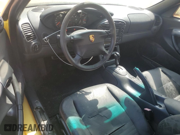 1998 Porsche Boxster с VIN WP0CA2982WU623104, выставлен на аукционе Copart как лот 50941005 с пробегом 78 486 миль миль и Чистый • Clean title. История ставок и продаж доступна на DreamBid. Изображение 8.