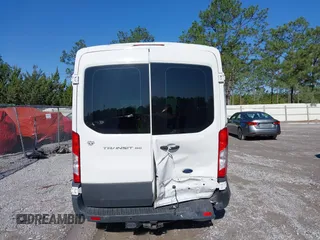 2016 Ford Transit Cargo with VIN 1FTYE1CM4GKB53505, listed as a IAAI auction lot 41958440 with 52,125 mi miles and . Bid and sale history available at carsss.com. Image 16.